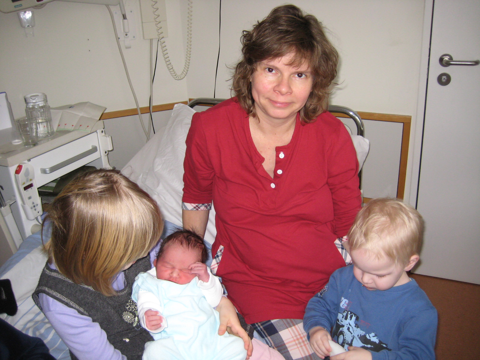 Maminka se t�emi nejmen��mi